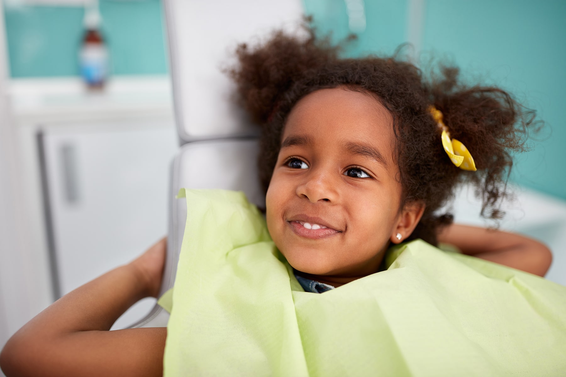 Girl at pediatric dental appointment in Golden, CO