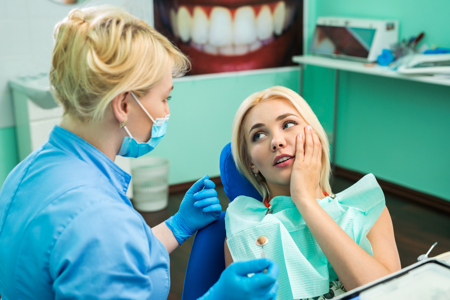 Woman with affordable emergency dental care in Golden CO