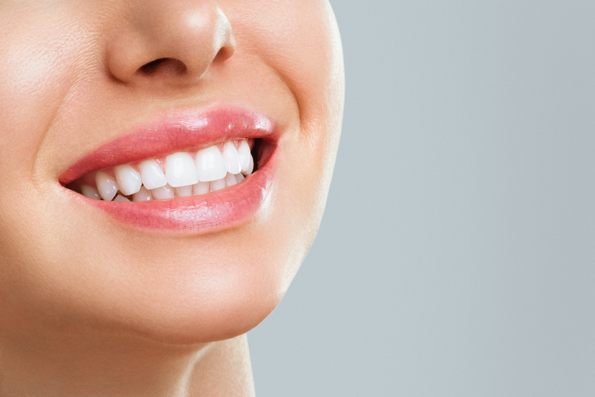 Woman with beautiful teeth after dental special at Colorado Dental Spa